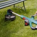 Bosch trimeris su virvele 480 W, pjovimo plotis 30 cm 06008A5400